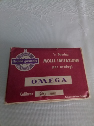 Omega molla carica - di,